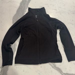 champion fleece jacket. all zippers work. soft. has a collar and pockets